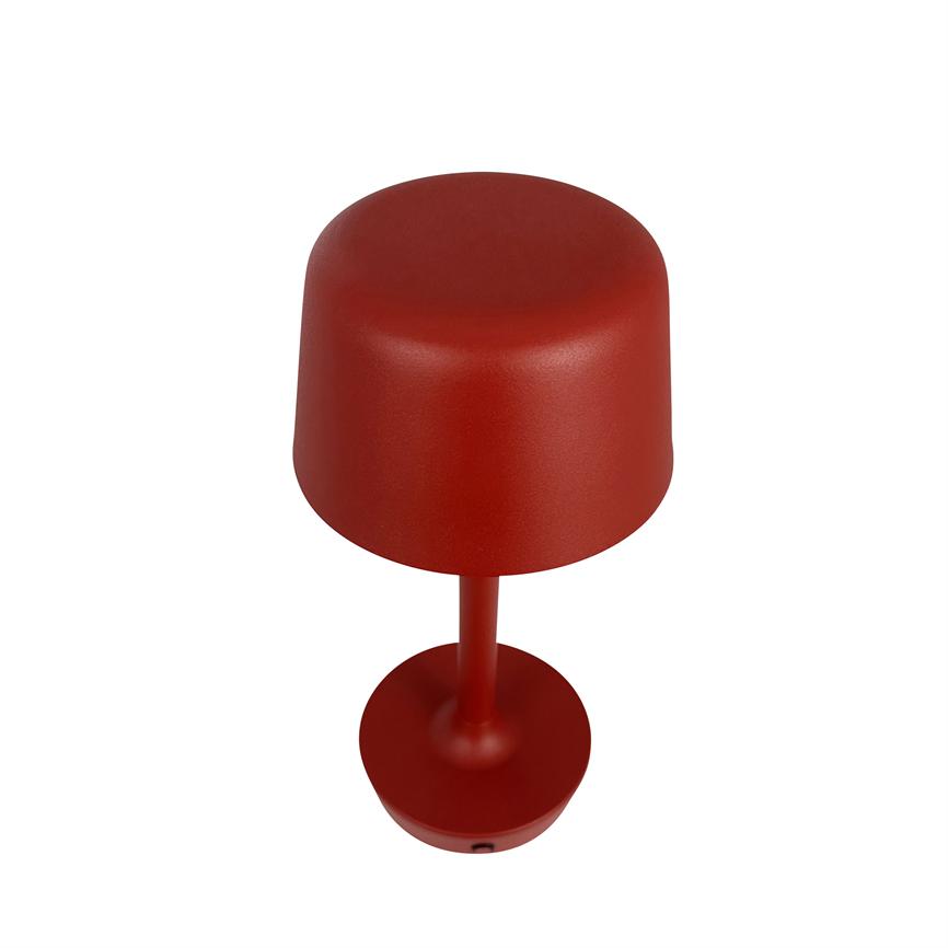 Die moderne rote Tischlampe steht allein mit einem abgerundeten zylindrischen Schirm auf einem schlanken Stab und rundem Sockel vor einem klaren weißen Hintergrund.