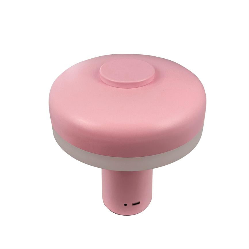 Runde, rosafarbene Nachtlampe in Pilzform (LED), aufrecht stehend mit breitem Oberteil und schmalem Sockel; weißes Mittelband und sichtbarer Micro-USB-Ladeanschluss an der Unterseite.